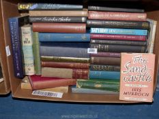 A box of books to include Christopher Columbus, The Sandcastle by Iris Murdoch,