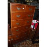 An unusual Oak Tallboy of two long and two short drawers,