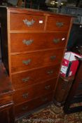 An unusual Oak Tallboy of two long and two short drawers,