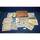 A cigar box and contents of old bank notes including Germany and Yugoslavia plus a set of