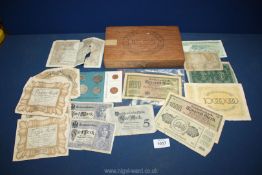 A cigar box and contents of old bank notes including Germany and Yugoslavia plus a set of