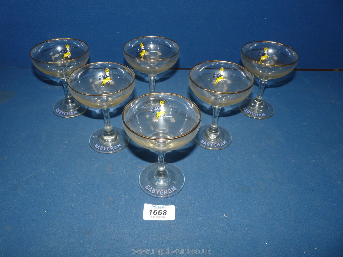 Six Babycham glasses.