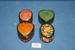 Four small papier mache trinket Pots in floral patterns, two marked 'Made in India', a/f.