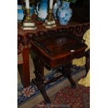 A fine Rosewood Workbox table, the top having an intricately fretworked upstand,