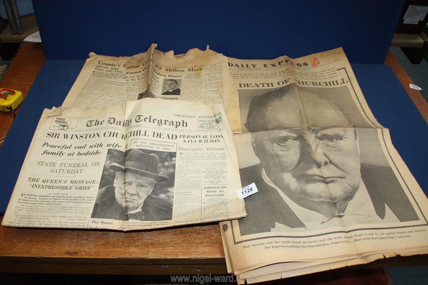 A small quantity of newspapers with articles of the death of Sir Winston Churchill.