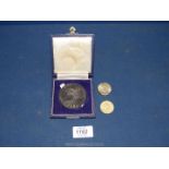 A presentation cased ''Royal Maundy 676 -1976 Hereford'' commemorative Coin,