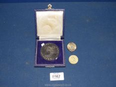 A presentation cased ''Royal Maundy 676 -1976 Hereford'' commemorative Coin,