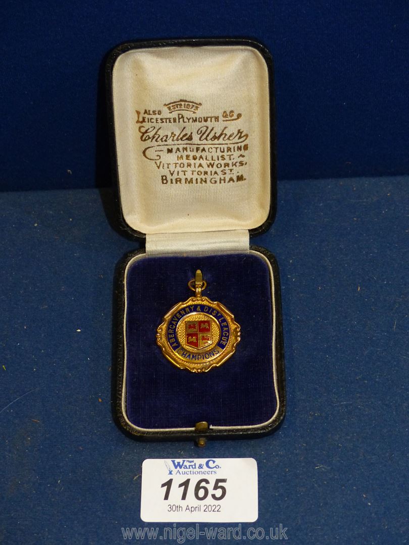 A 9ct gold and enamel 'Abergavenny League Champions 1923-24' Medal in blue and red to the crest and