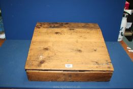 A table-top Clerks Desk, 19'' x 19 1/4'' x 6 1/4'' deep.