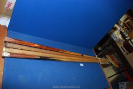 Five Snooker Cues, one cased, 'The Walter Lindrum', inlaid, etc.