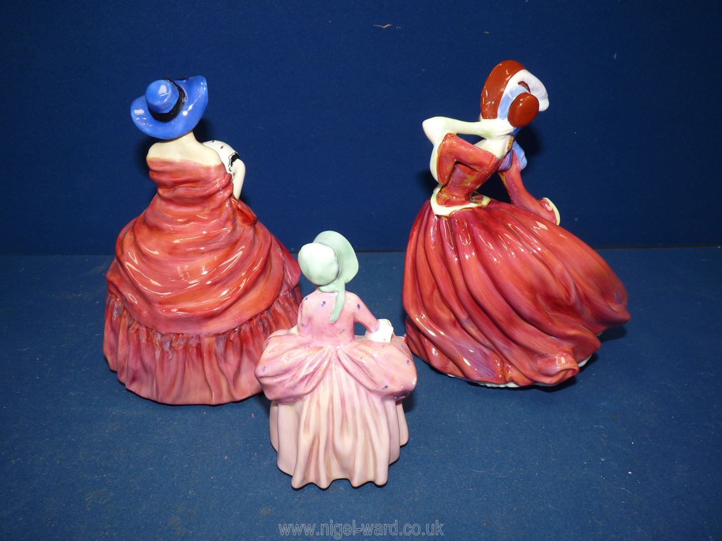 Three Royal Doulton figurines including 'Genevieve', 'Autumn Breezes' and 'Bo Peep'. - Image 2 of 5