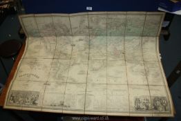 A Planisphere World Map dated 1857 in French on fabric backing, 44 1/4" x 33 3/4".