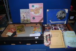 A box of miscellanea including Wimbledon '85 Official booklet, Margaret Tarrant Print, puzzle,