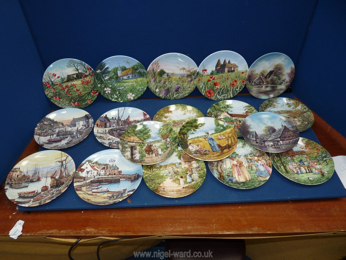 A quantity of Wedgwood plates, Ltd edition 'The Steam Fair', 'May Day', 'The Cricket Match',