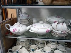 A KPM Germany Krister white ground with pink floral decoration part dinner set and part teaset to