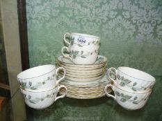 A Minton part Teaset in Greenwich pattern comprising six cups, six saucers and six side plates.