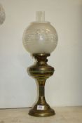 A Brass oil Lamp with chimney and shade, 23" tall.