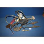 A quantity of metal items including shearing clippers, trivet, watering can spout, etc.