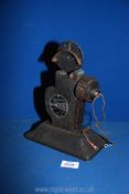 A 1930's hand-cranked 9.5 mm cine projector "Ray" by Construments, London, model no. 29064.