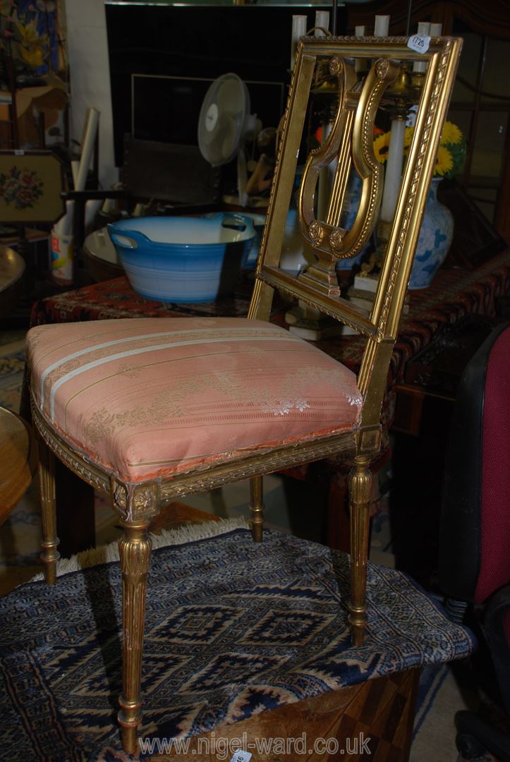 A pretty gilded framed lyre-back Side Chair having turned and fluted legs,