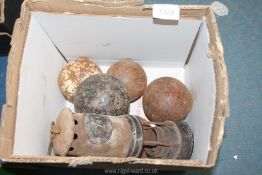Six old Cannon Balls and an old rusty Miner's lamp by Thomas & Williams No.