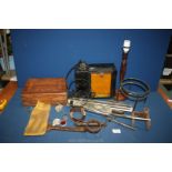 A quantity of miscellanea including music stand, vintage light box, cart wheel hub spanner, etc.