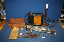 A quantity of miscellanea including music stand, vintage light box, cart wheel hub spanner, etc.