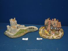 Two rare Lilliput models of Eilean Donan castle, 10 1/2" long and Tudor Court, 8 1/2" long, boxed.