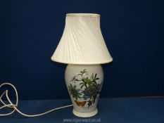 A 'Botanical Garden' pattern Table Lamp with white shade, 17'' tall.
