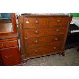 A circa 1900 Oak Chest of three long and two short drawers having turned wooden knobs and spiral