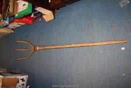 A primitive style Hay Pitchfork.