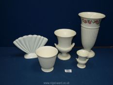 Four Wedgwood vases including 'Rosalind, plus an unmarked multi stem vase.