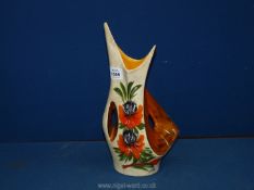 An Art Deco style French vase with floral detail, signed 'Tess', 12 1/2'' tall (chip to base).