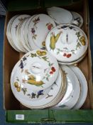 An Evesham Royal Worcester dish washer safe, part dinner service including 2 meat plates,