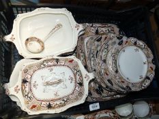 A good quantity of dinner ware with Chinese landscape scenes in brown and white including tureen,