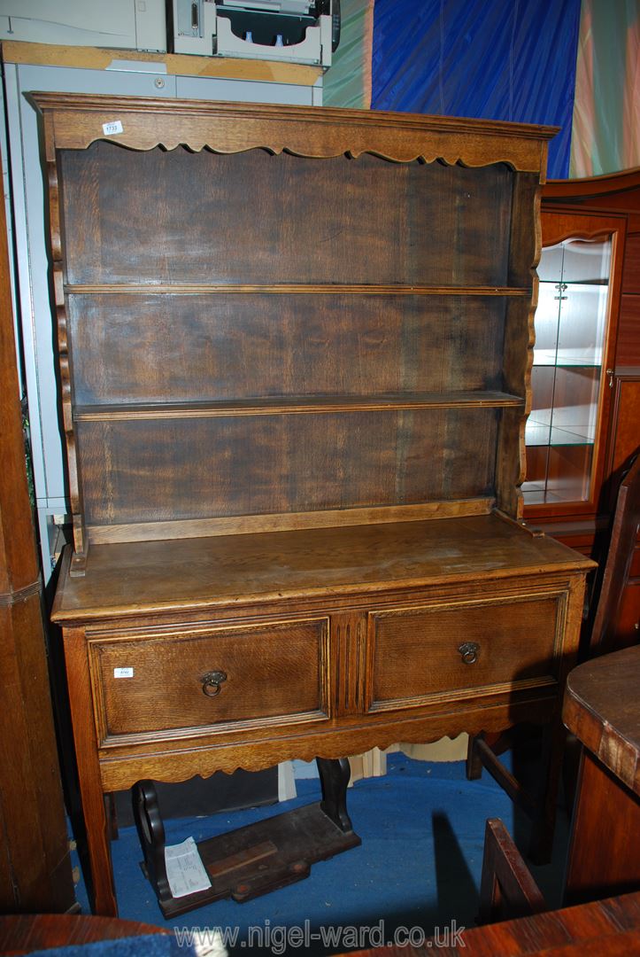 A mid Oak 1930's/40's Dresser having two deep drawers to the base standing on square chamfered legs