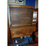 A mid Oak 1930's/40's Dresser having two deep drawers to the base standing on square chamfered legs