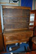 A mid Oak 1930's/40's Dresser having two deep drawers to the base standing on square chamfered legs