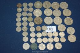 A quantity of English coins including half crowns, florins, shillings and sixpence pieces.