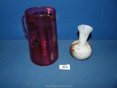 A Mdina white mottled and rust vase 5" tall and a large 19th c. cranberry jug 7 1/2" tall.