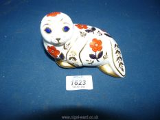 A Royal Crown Derby Seal paperweight with gold stopper.