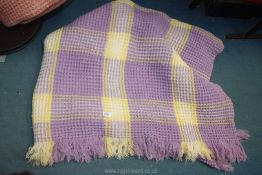 A double Welsh Wool waffle weave Blanket in mauve and lemon.