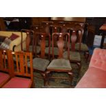 A set of nine elegant Walnut framed Dining Chairs of traditional Queen Anne design having cabriole