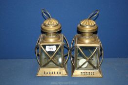 A pair of brass effect Lanterns, 9 3/4'' tall.