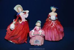 Three Royal Doulton figurines including 'Genevieve', 'Autumn Breezes' and 'Bo Peep'.