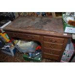 A circa 1900 Oak single pedestal Desk and pedestal with four short drawers,