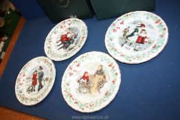 Four Victoria and Albert Wedgwood Christmas plates with certificates of authenticity.