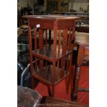 An Oak Arts and Crafts style Etagere/Lamp Table/Jardiniere stand, 16" x 15 5/8" x 36 1/2" high.