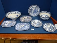 A quantity of blue and white china including Wedgwood willow pattern octagonal bowl and plates,