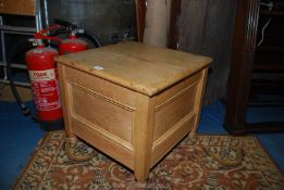 A light Pine box Commode standing on turned legs, 19 3/4" deep x 19" wide x 17 3/8" high.